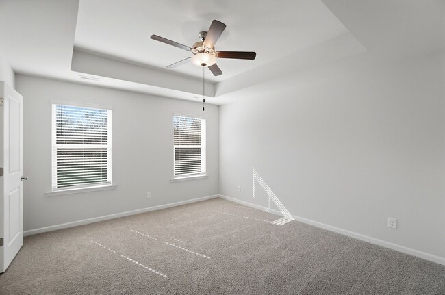 Building Photo - 4BR Home in The Pines at Paw Creek – New Construction + Private Deck