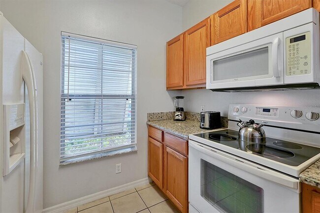Building Photo - 8591 Bay Lilly Loop