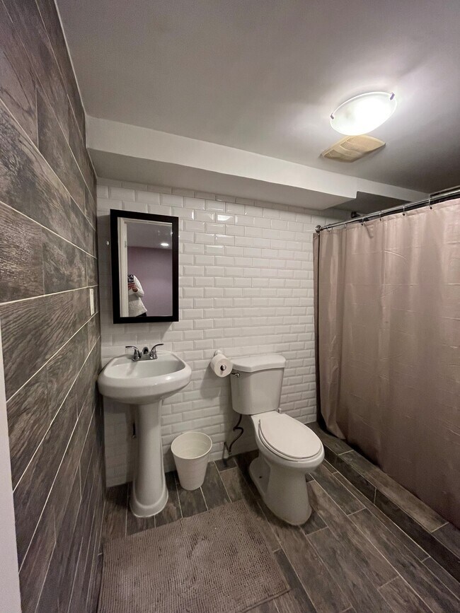Lower level full bathroom with spa shower - 192 Hart St