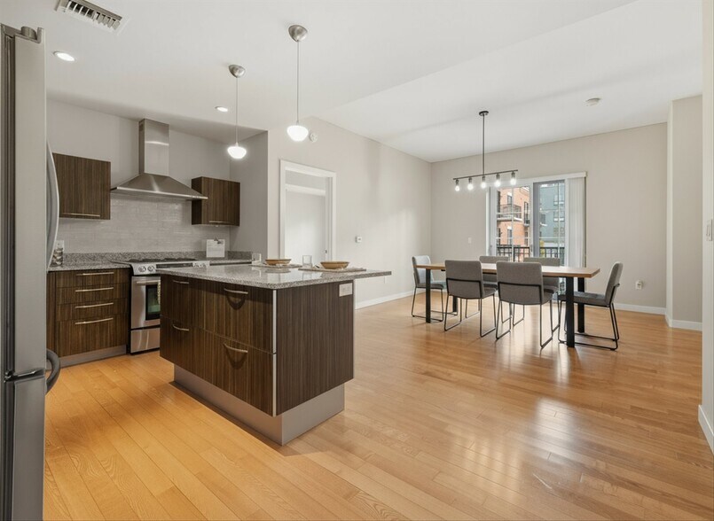 KItchen w/ Virtual Staged Dining Room - 410 Acoma St