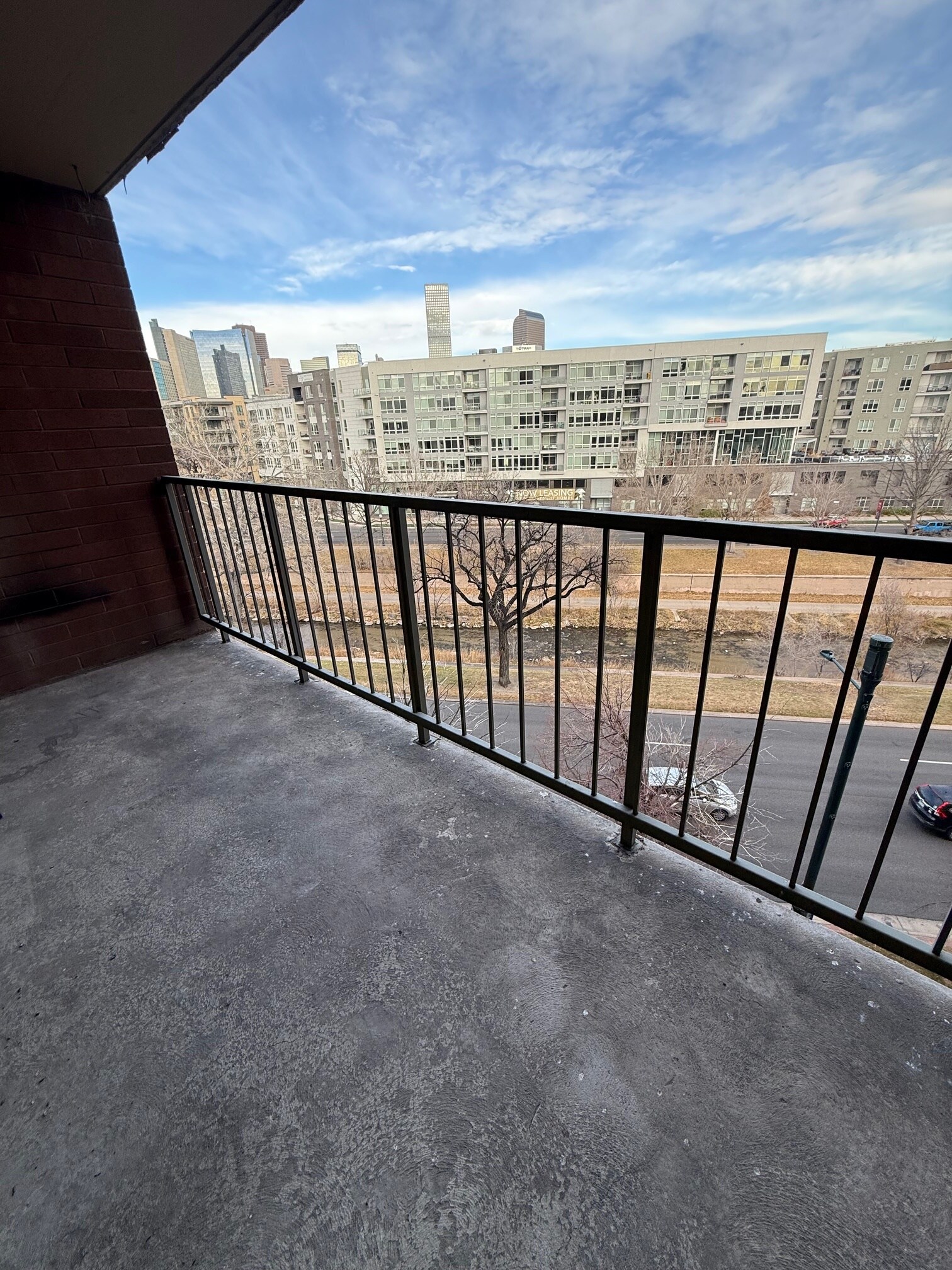 Balcony with view of Cherry Creek Trail - 1301 Speer Blvd