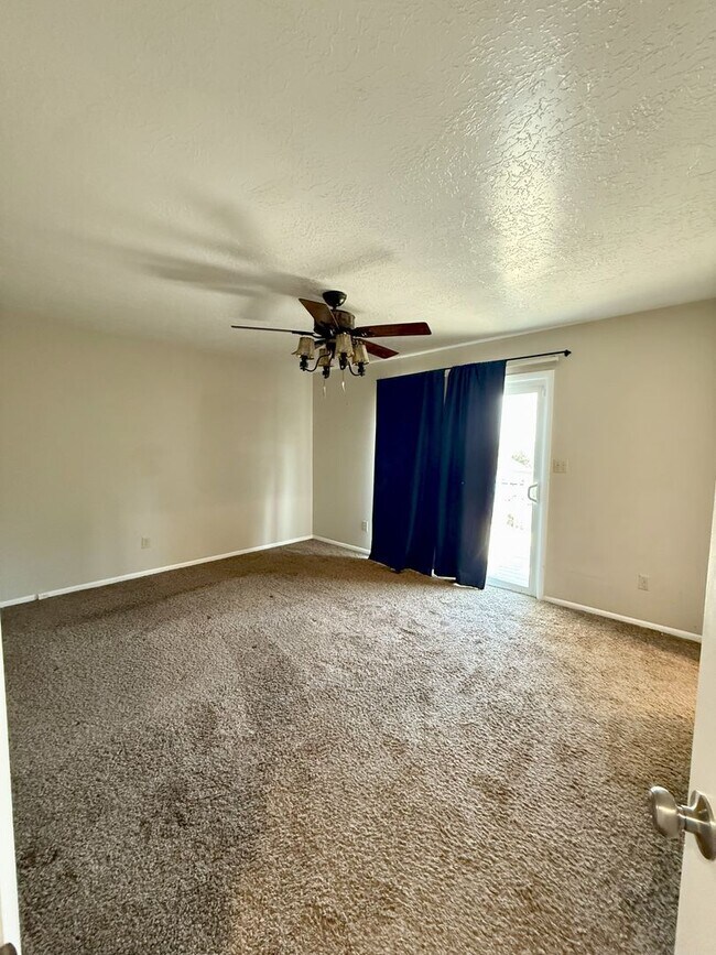 Building Photo - Spacious Comfort Meets Practical Living in...