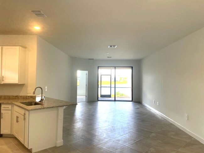 Building Photo - New Construction 2 Bedroom PLUS a Home Office Available in Lorraine Lakes