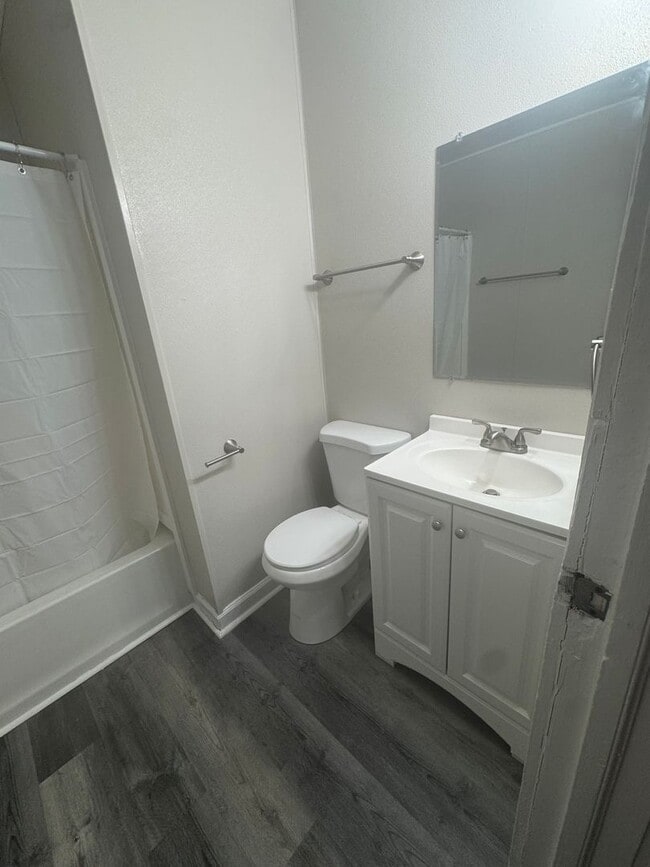 Building Photo - Cute two bedroom house with hardwood floor...