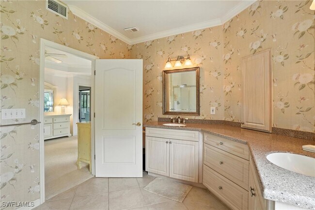 Building Photo - 7032 Pelican Bay Blvd