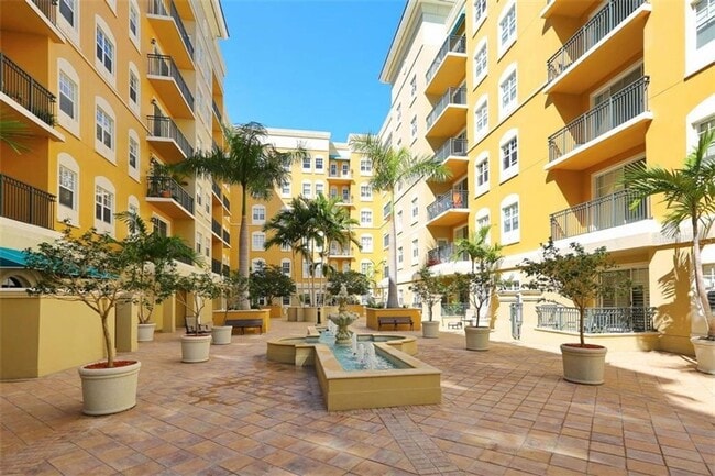 Building Photo - Annual UNfurnished 2/2 condo on top floor ...