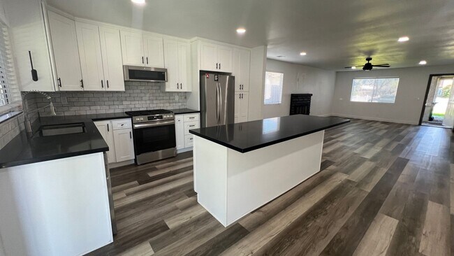 Building Photo - UPGRADED 4 bedroom 2 bathroom home