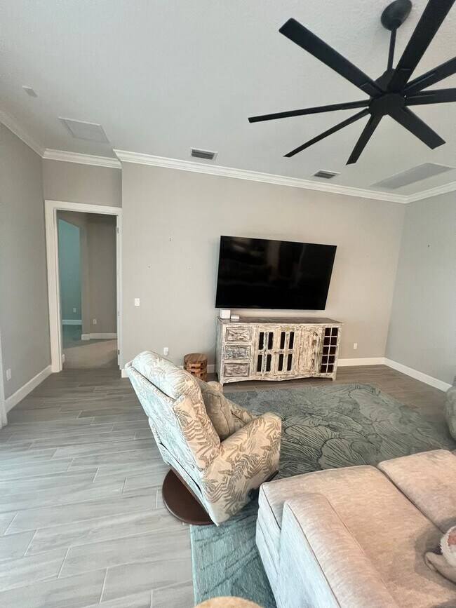 Building Photo - STUNNING LAKEFRONT 3 BEDROOM, 2.5 BATH HOM...