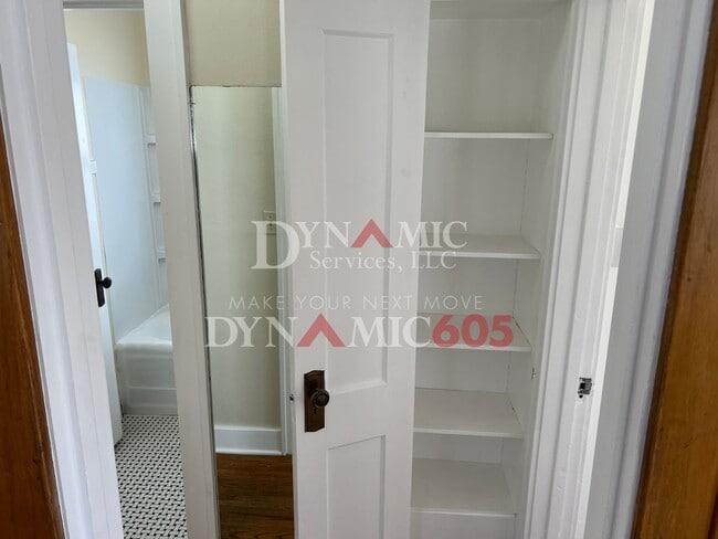 Building Photo - 4+ Bedroom, 2 Bath House with Garage and Fenced Backyard