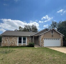 Building Photo - Corner Lot with Large Deck and Cozy Backyard