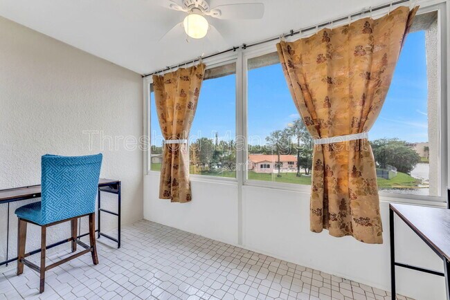 Building Photo - 8515 Sunrise Lakes Blvd