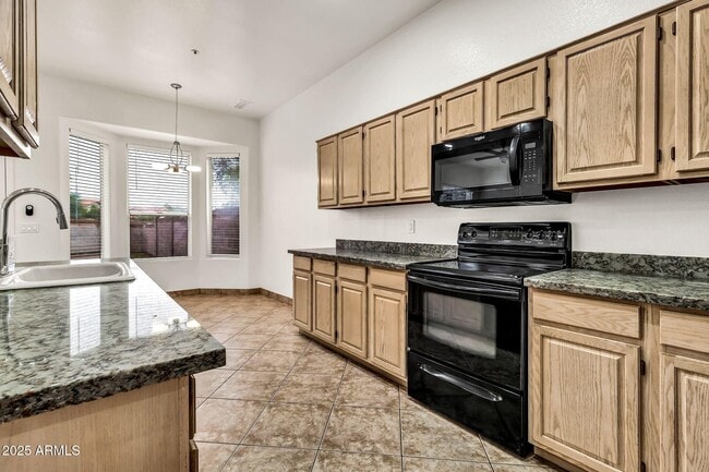 Building Photo - 9379 E Windrose Dr