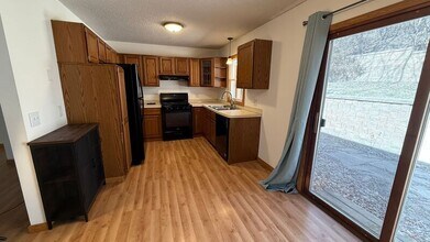 Building Photo - 8627/8635 Woodlawn Dr