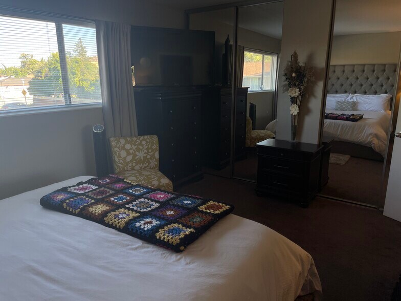 Two tall mirrored closets - 59 Meadowbrook Ave