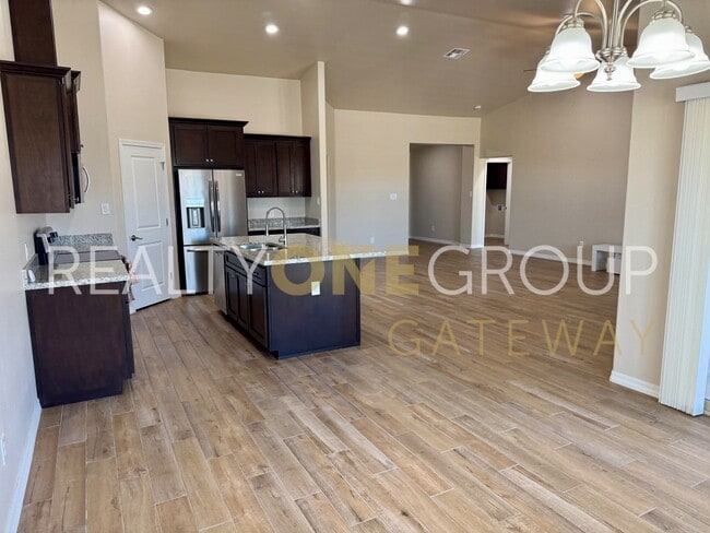 Building Photo - Enjoy those Arizona Sunset in this Three Bedroom Two Bath Home full of upgrades !!