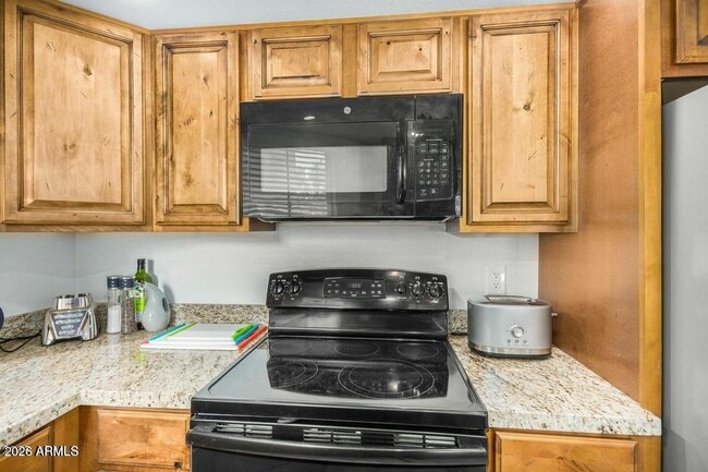 Building Photo - 4850 E Desert Cove Ave