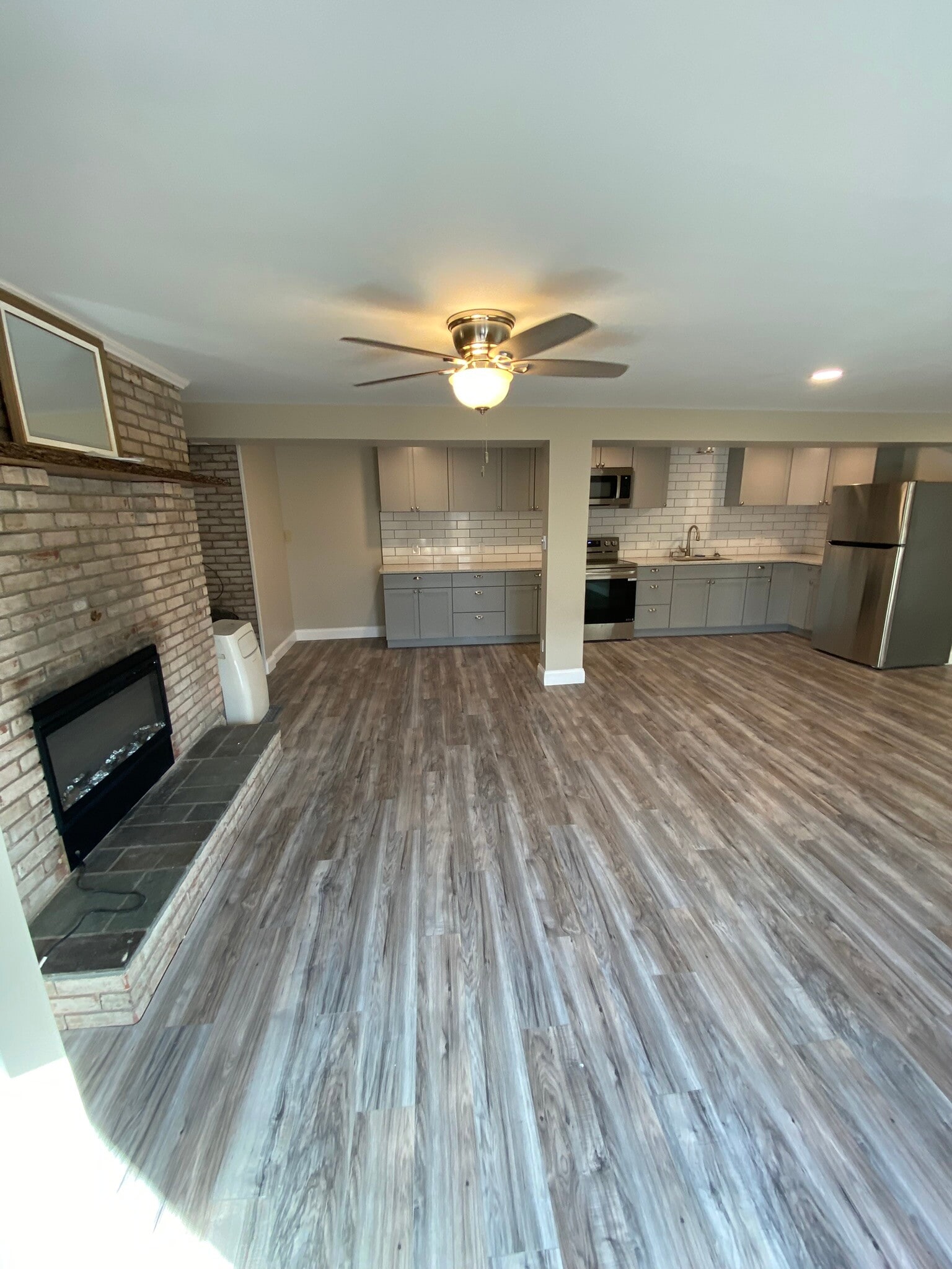 Open Concept Living Room & Kitchen - 12402 Buchanan Trl W