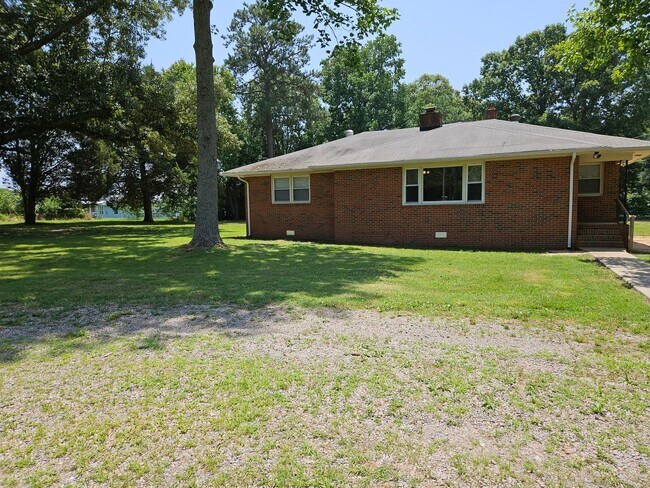 Building Photo - Charming Brick Rancher on Massive Lot – Move-In Ready!