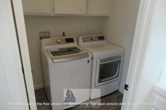 Building Photo - Welcome to this stunning 2-bedroom condo in gated community