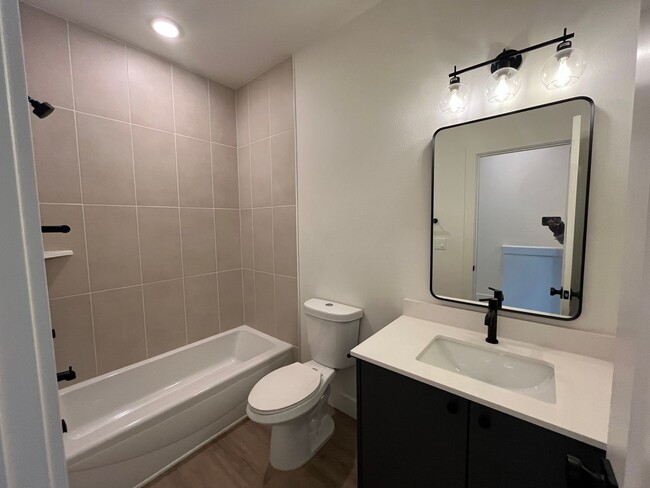 Building Photo - Modern 2-Bed, 1.5-Bath Condo with Custom K...