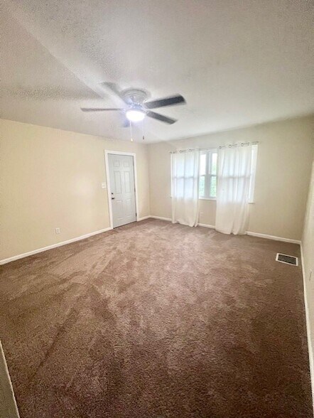 Carpet has been replaced with lvp flooring - 1988 Vaughn St