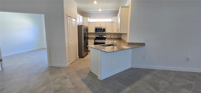 Building Photo - 15810 Sunny Day Dr