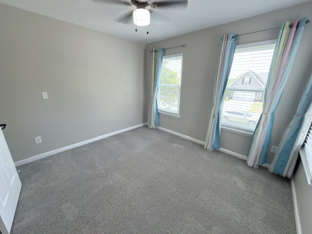 Building Photo - Spacious 4BR Home with Fenced Yard, Community Pool & 2-Car Garage