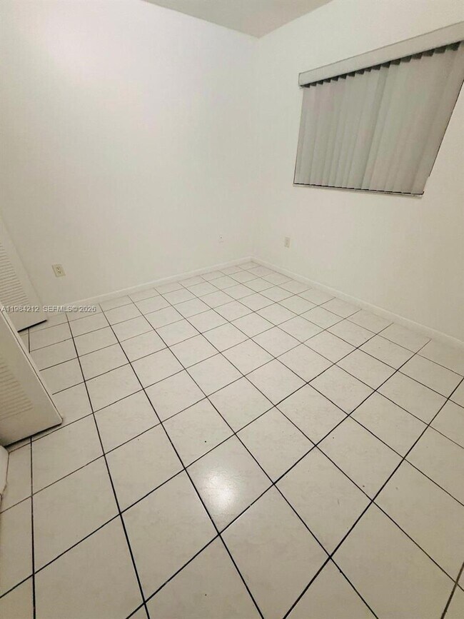 Building Photo - 6395 W 22nd Ct