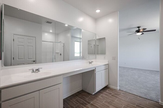 Building Photo - HOME IN LAVEEN! 4 BED 3.5 BA 3 CAR GARAGE!...