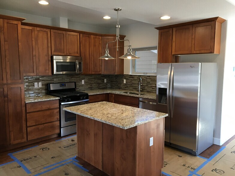 Custom cabinets, granite tops - 11625 W 62nd Pl