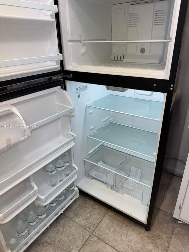 Building Photo - 8450 Sunrise Lakes Blvd