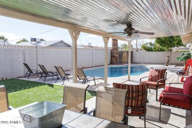 Building Photo - 8447 E Sheridan St