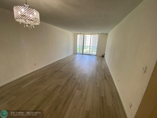 Building Photo - 19380 Collins Ave