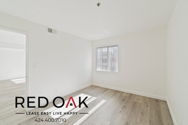 Building Photo - ~1 Month FREE~ Stunning Two Bedroom with a...