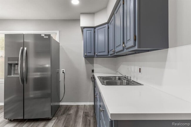 Building Photo - Cozy & Modern: 2-Bed Brick Home with Garage & Finished Basement