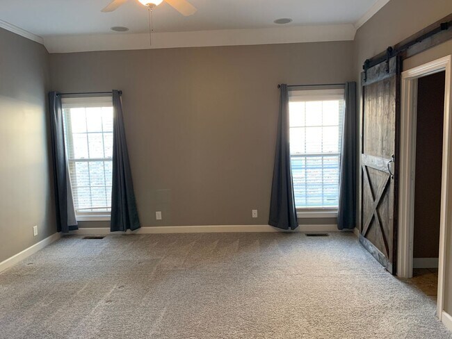 Building Photo - Luxury Living! Beautiful Brick Home in Sango with 3 car garage.