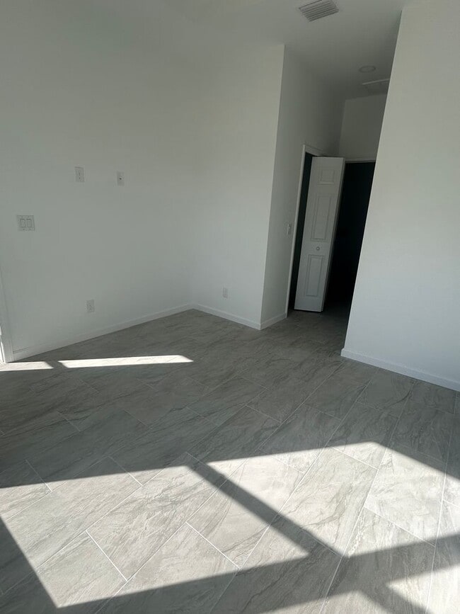 Building Photo - BRAND NEW CONSTRUCTION- 4 Bedroom 2 Bath-2 Car Garage-Serene Lake Placid Location