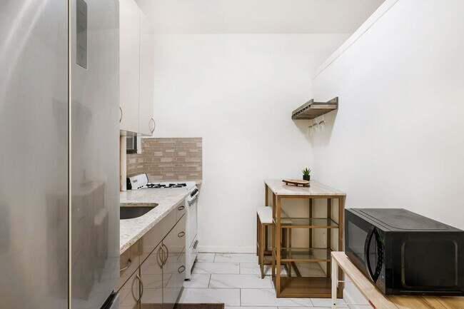 Building Photo - 428-430-430 W 47th St