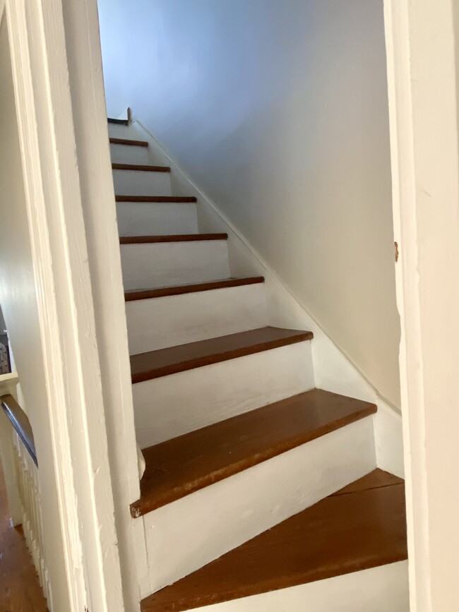 Stairs to bonus 3rd floor loft work/living space - 16 W College Ave