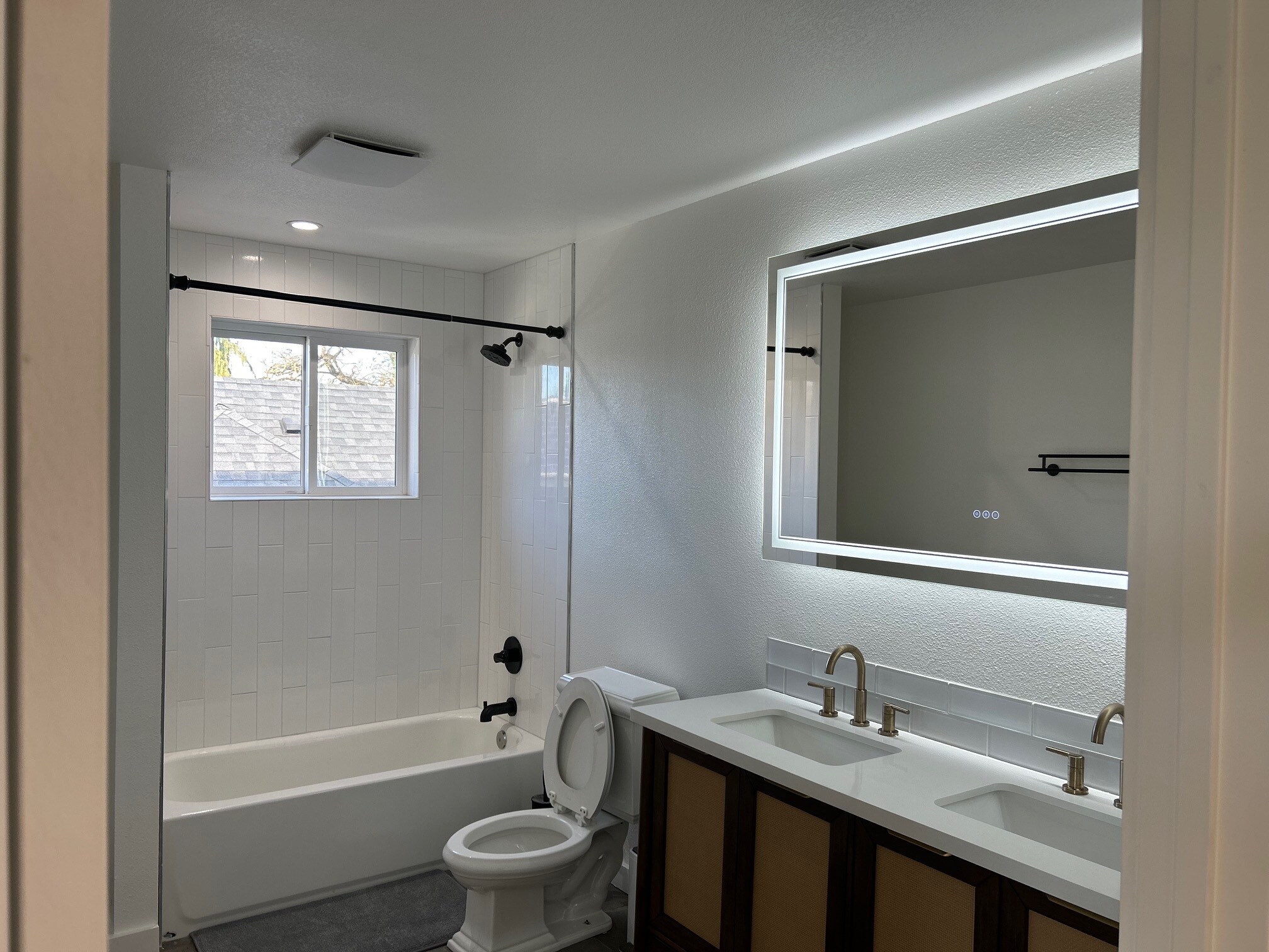 2nd bathroom with double vanity & heated floors - 4022 NE Mallory Ave