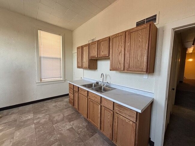 Building Photo - All Utilities Included!