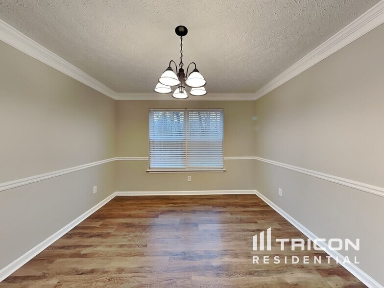 Building Photo - 8665 River Rock Ct
