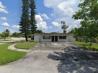Building Photo - 6400 NW 20th Ct