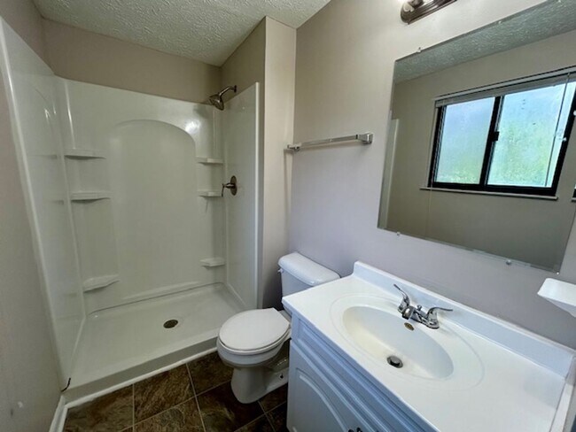 Building Photo - Welcome Home to This Beautifully Maintained Tri-Level Gem!