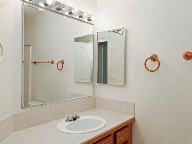 Building Photo - June Rent Free!!  Move Today!  Four Bedroom, Three Bath Home with Beautiful Backyard, Two Car Gar...