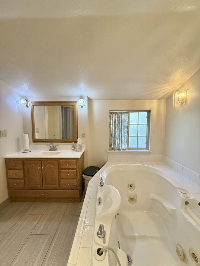 Building Photo - Timeless Charm, Modern Living — 4-Bed Gem ...