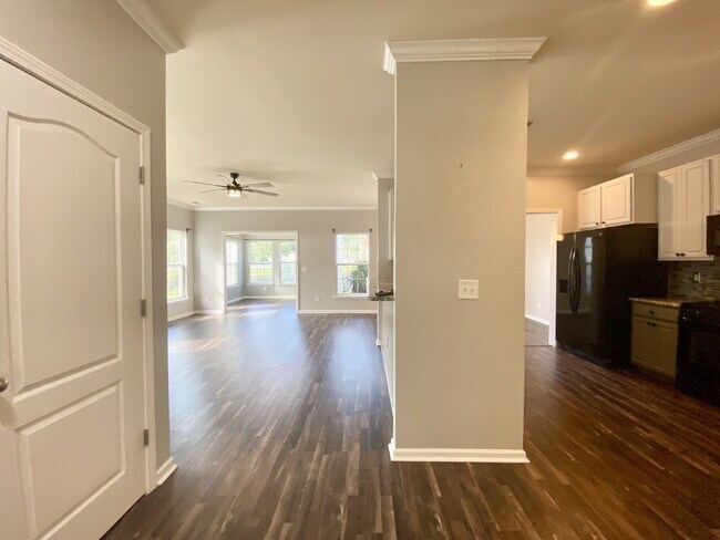 Building Photo - Three Bedroom Home with fenced-in Backyard oasis!