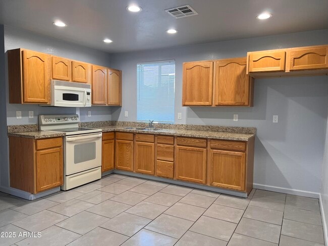 Building Photo - 215 N Pima Rd