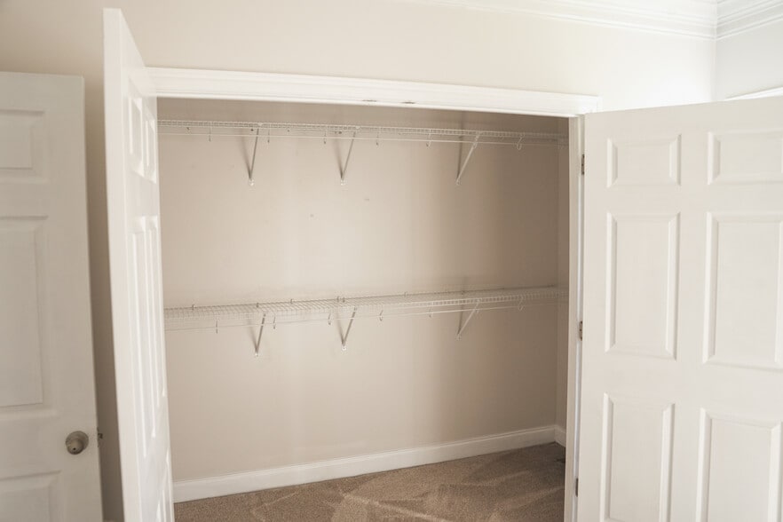 Primary Bedroom Walk-in Closet (11x4) - 393 Hays Blvd