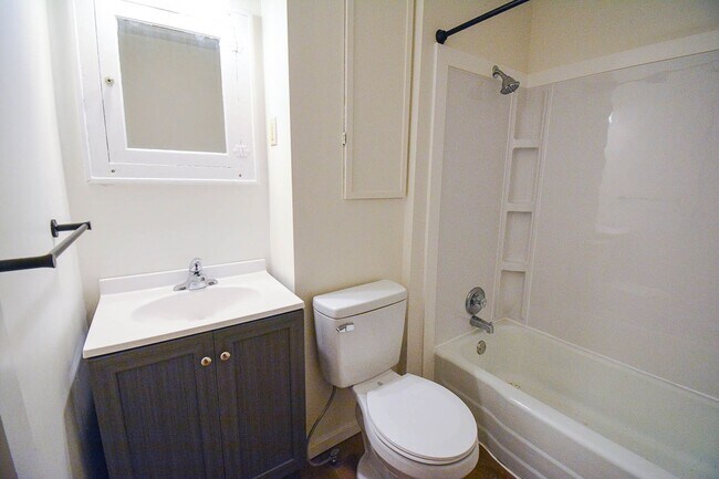 Building Photo - Bright & updated 2br Uptown home w/garage!